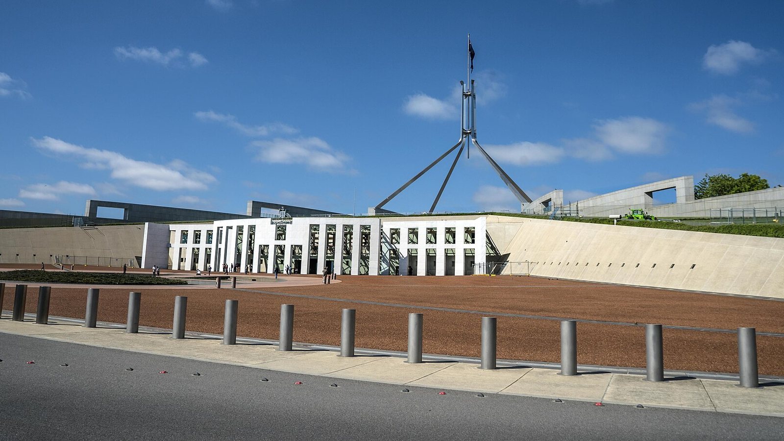 The forecourt and flagpole of Parliament House in Canberra, Australia