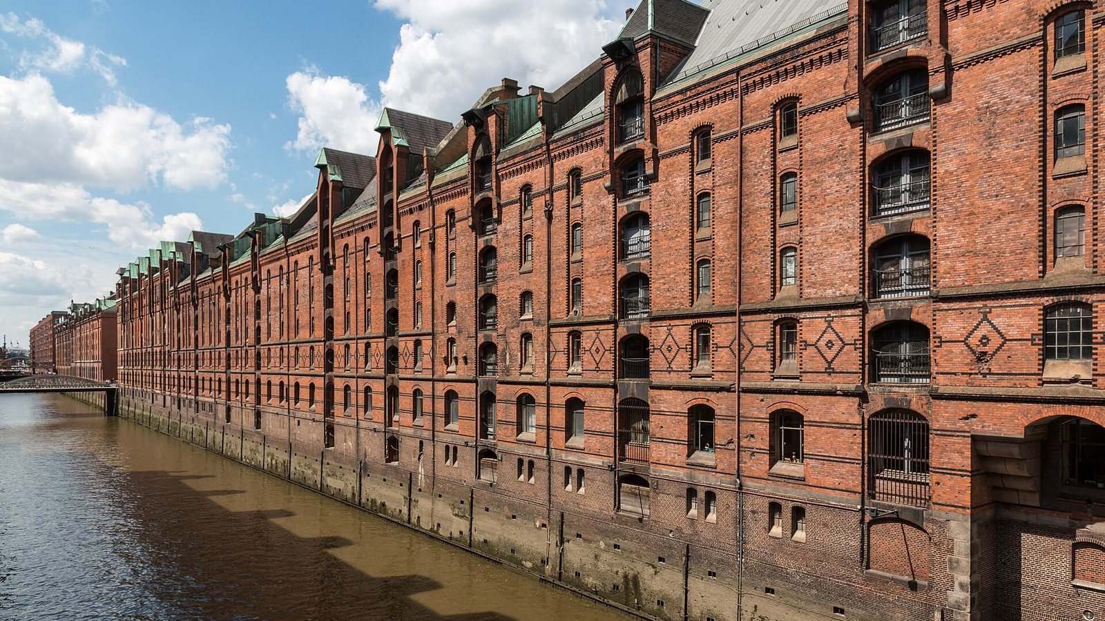 Brick warehouses along a canal in the Speicherstadt district of Hamburg