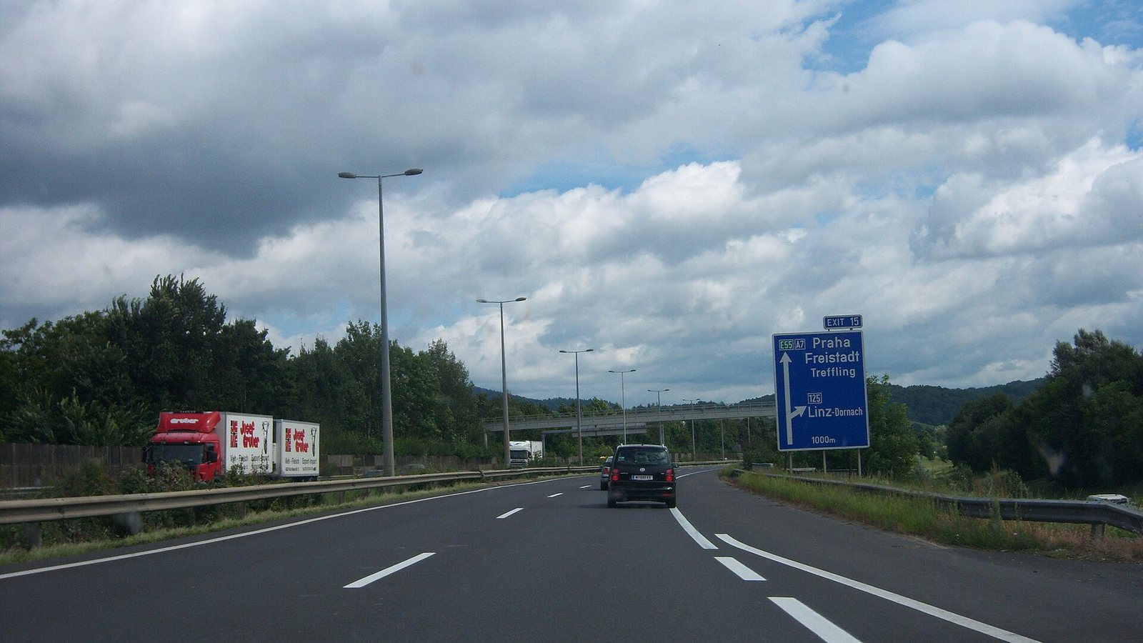 An Austrian motorway near Linz with a sign pointing to Prague