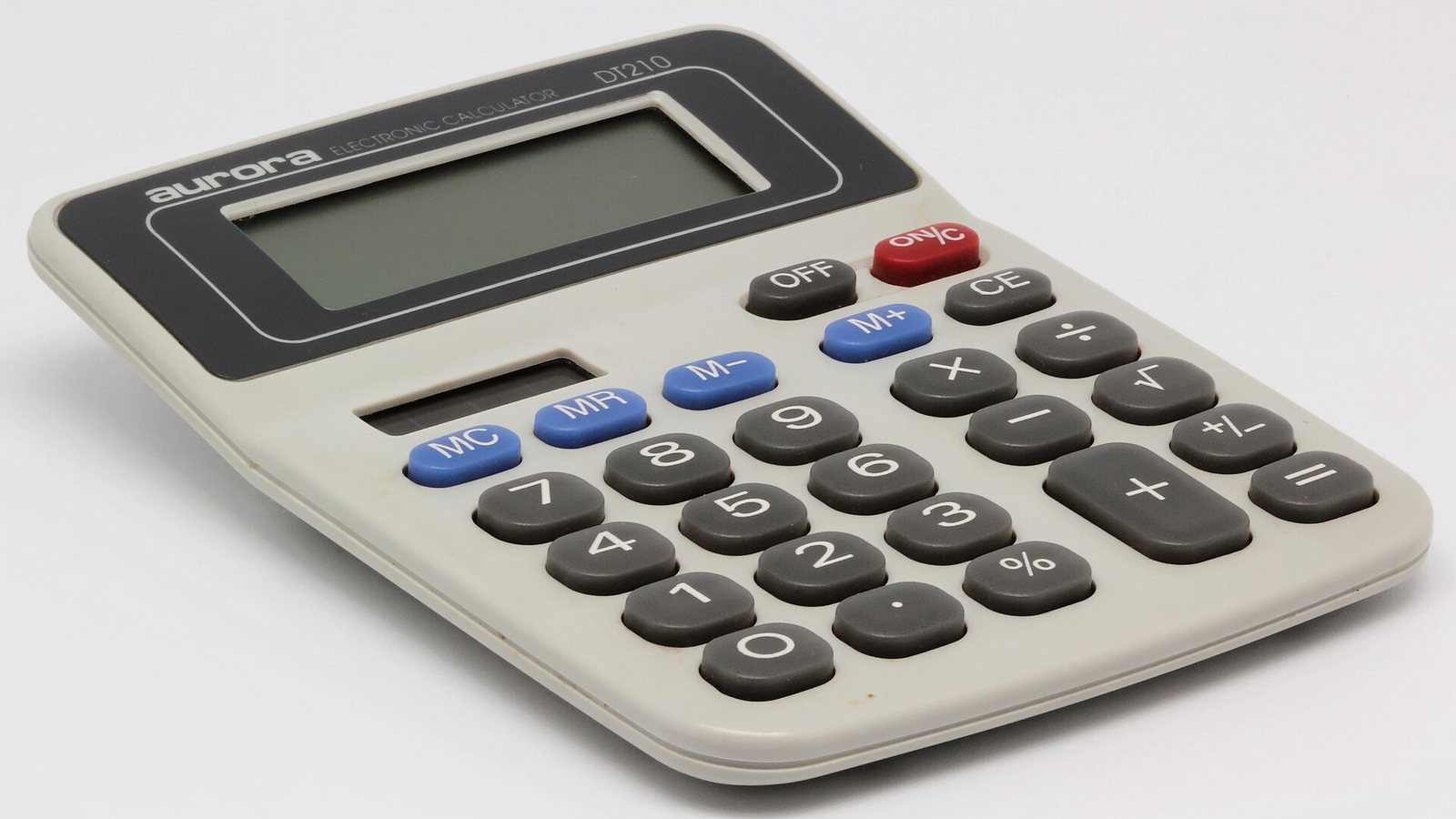 A desktop electronic calculator on a white background