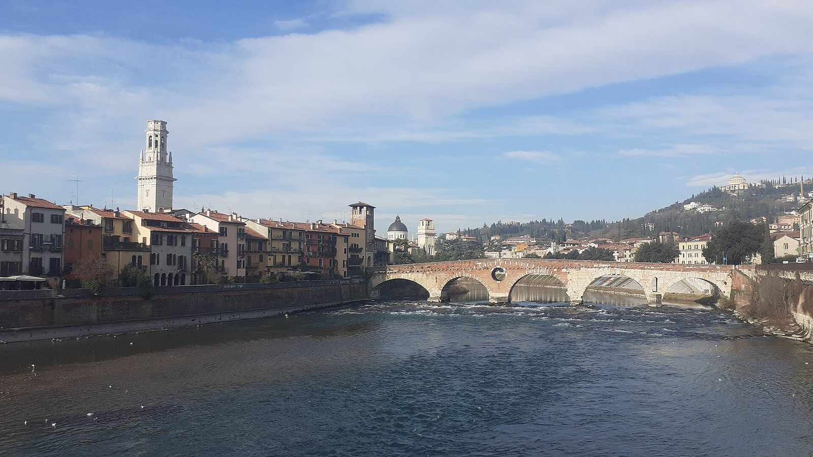 The Adige river and the Ponte Pietra bridge in Verona, Italy