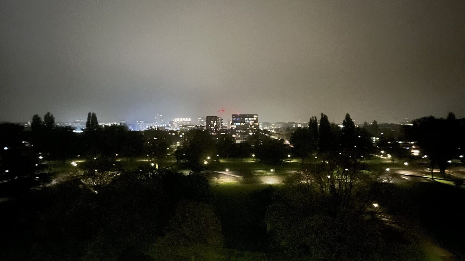 A Distant view of an Amsterdam Skyline at night