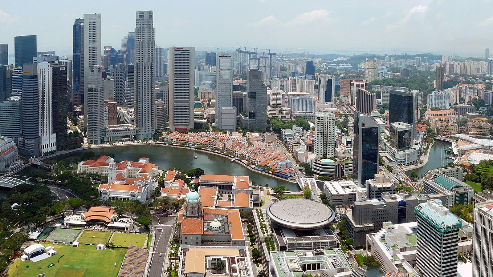 Aerial daytime view of the Singapore River, Boat Quay shophouses and the towers of the central business district
