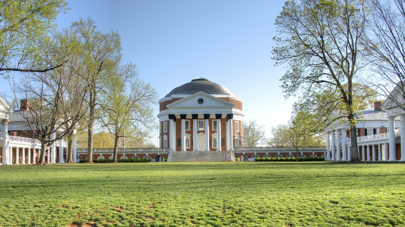 The domed Rotunda and lawn at the University of Virginia, flanked by white colonnades